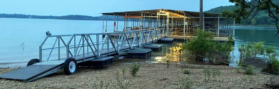 Covered boat dock with 28 slips at Coppermine Lodge on Beaver Lake