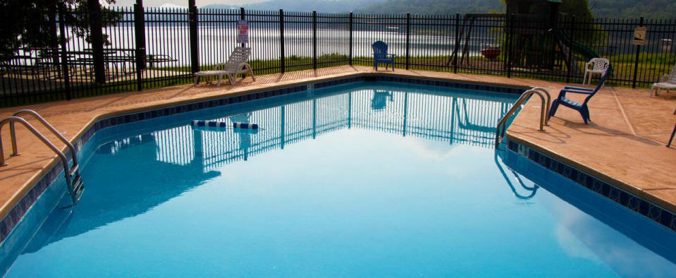Swimming pool with Beaver Lake view at Coppermine Lodge resort